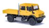 Busch 51080 Unimog 5023 platós teherautó, duplakabinos - sárga (H0)