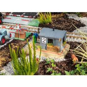 Pola 330878 Vasúti őrbódé sorompótekerő figurával motoros (G)