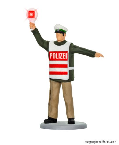 Viessmann 1518 Német közlekedési rendőr figura, világító jelzőtárcsával (H0)